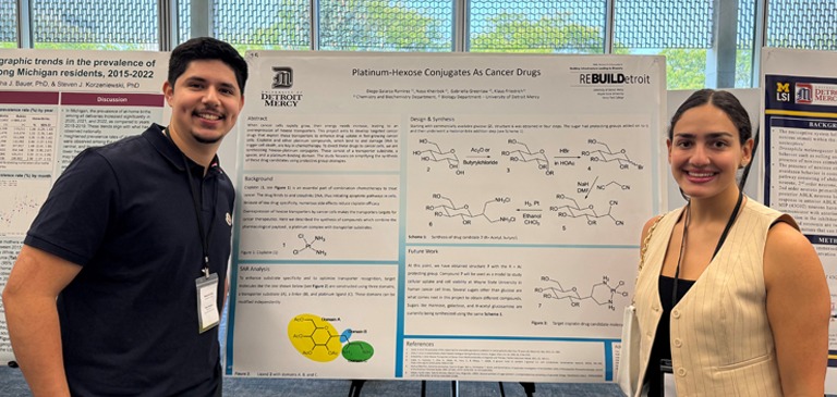 students presenting research posters