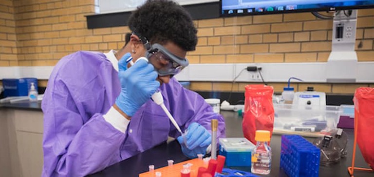 college student in lab